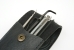 A set of lock pick tools in a leather wallet