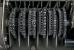 The 6 pin-wheels of a military CX-52, with alternating letters and numbers.