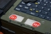The two purge buttons in front of the keyboard
