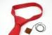 Subminiture transmitter that can be hidden in the knot of a necktie