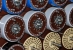 Breaking Enigma with the Polish BOMBA, the British BOMBE and the US BOMBE.