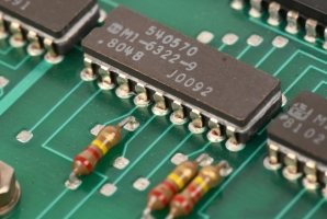 Replacement ROMs soldered to the reworked processor board