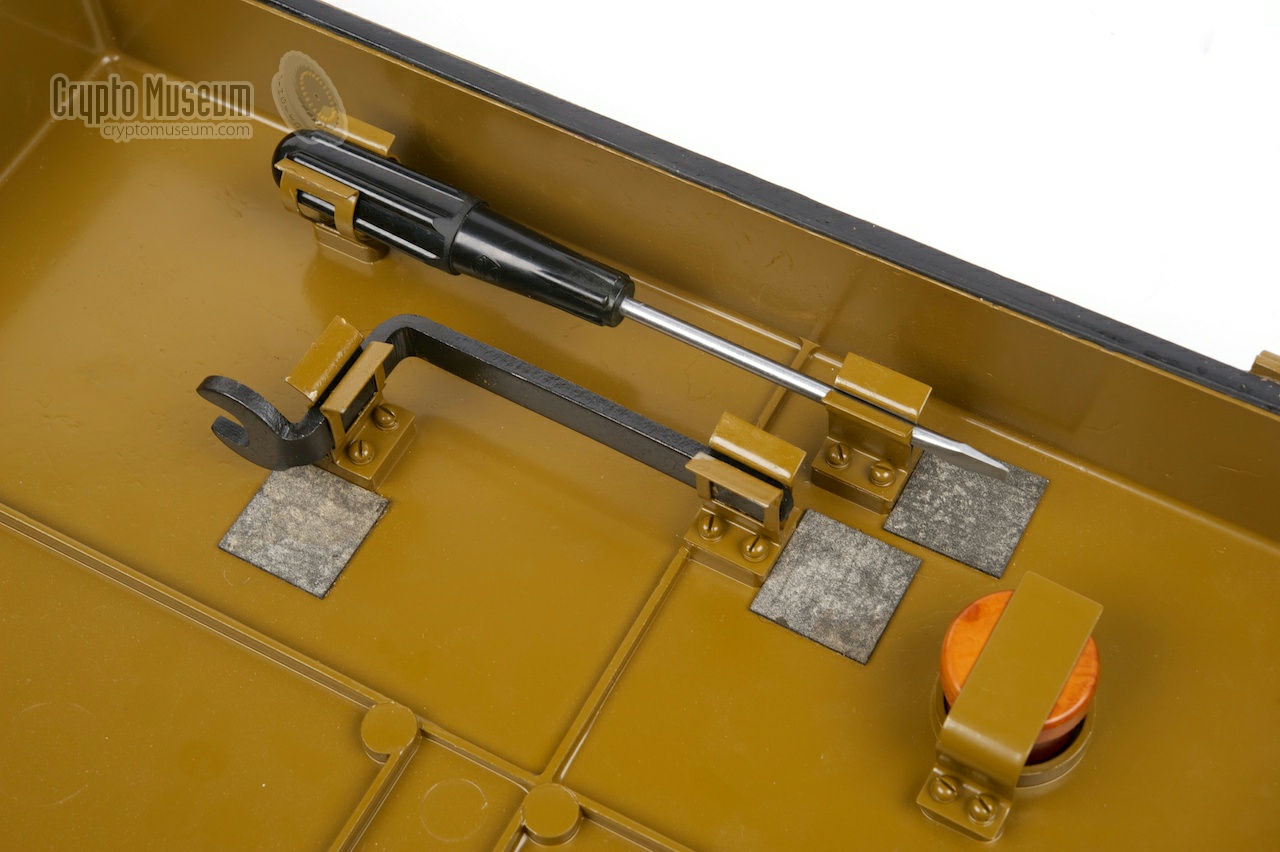 Tools and spare fuses stored in the top lid