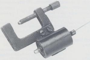 M7014 antenna matching unit with clamp and antenna wire. Click to enlarge.