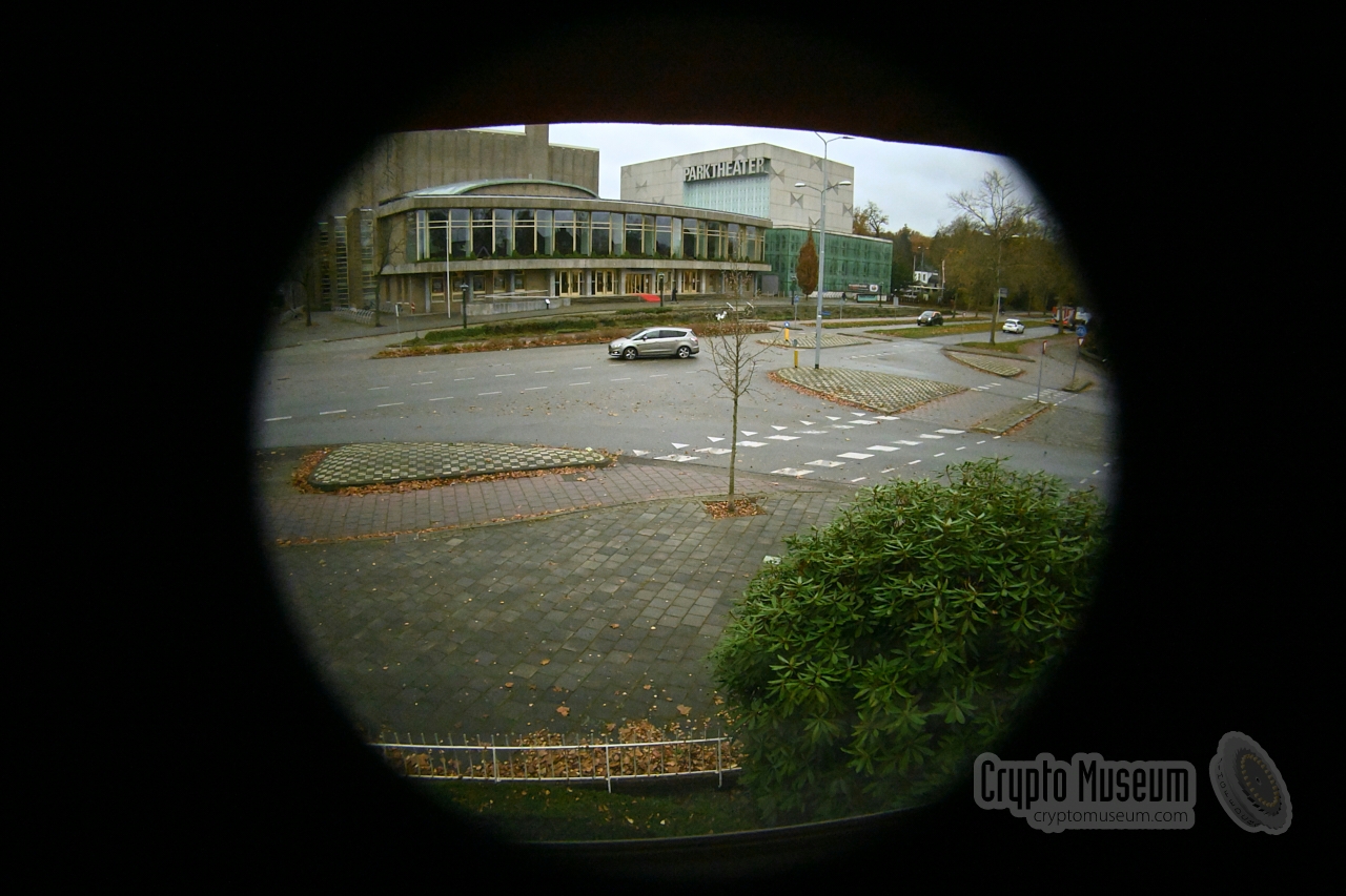 A view of the street through a 1 mm hole