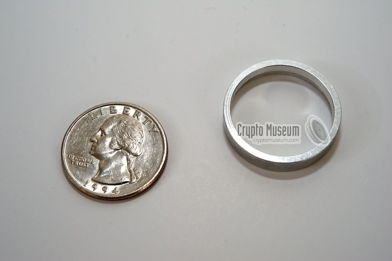 Rigged ring used for opening the coin