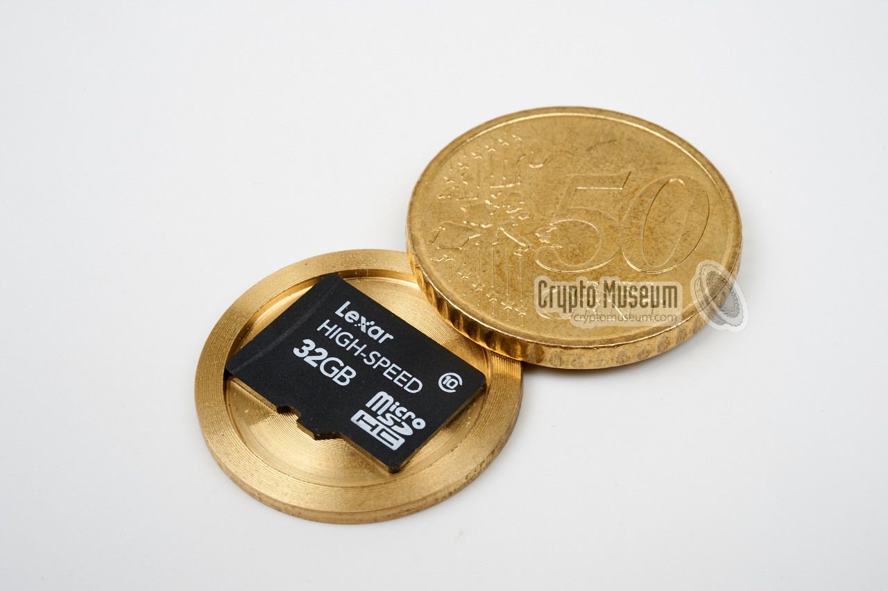32GB Micro-SD memory card inside a 50 Euro-cent coin