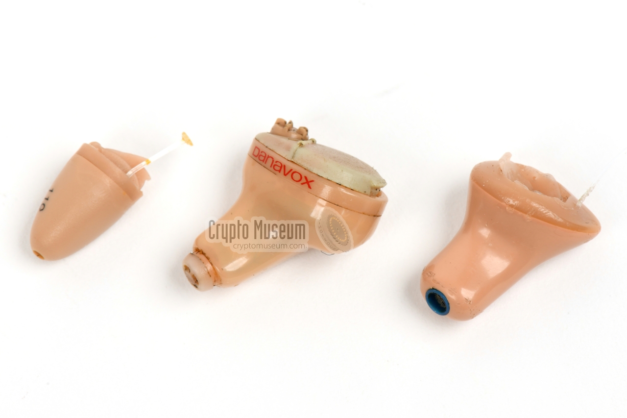 The Danavox 131-CD/T (centre) shown aside the Sonic LD-5 and a brandless sub-miniature earpiece