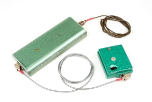 Alarm transmitter with antenna and remote control unit