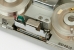 The recording wire guided past the audio head