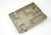 Compartimented die-cast aluminum bottom case shell