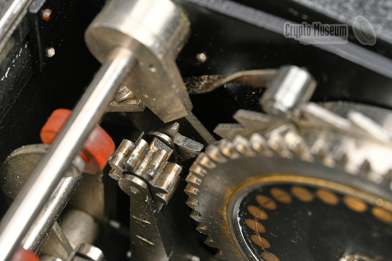 Actuator behind ratchet wheel