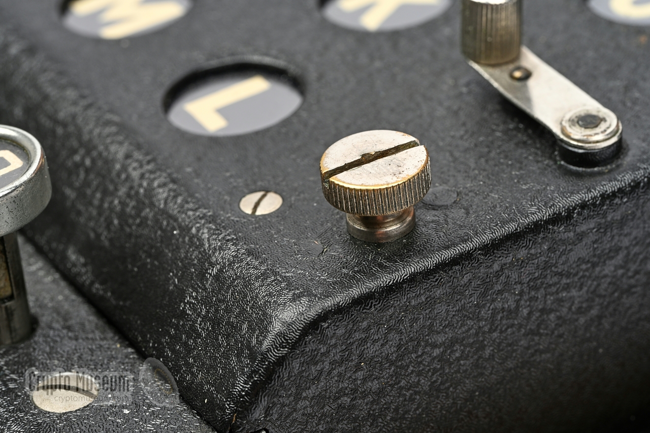 Lamp panel hold-down bolt