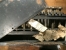 Debris inside the machine. Note the serial number at the front panel.