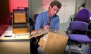 BBC presenter Jeremy Paxman with the returned Enigma G312. Photo courtesy BBC News 2000 [5].