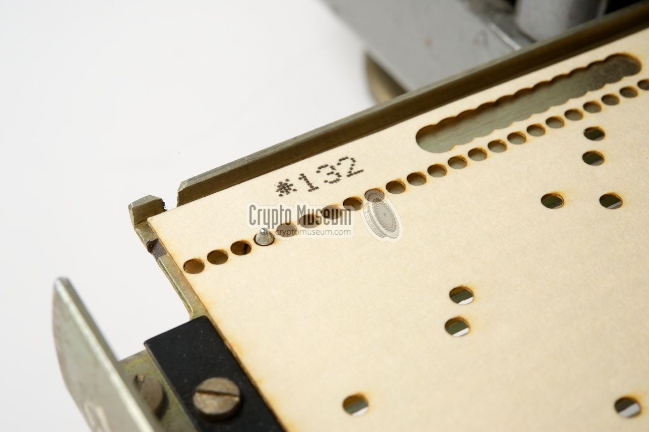 Close-up of a reproduction Fialka key card with S/N 132