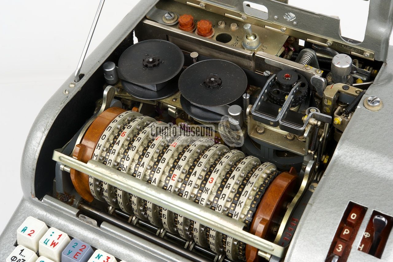The cipher wheels inside the machine, with the ruler in the normal position.