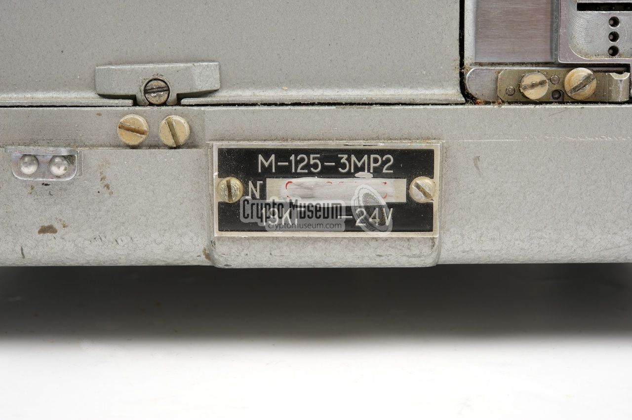 Serial number at the lower front of the machine