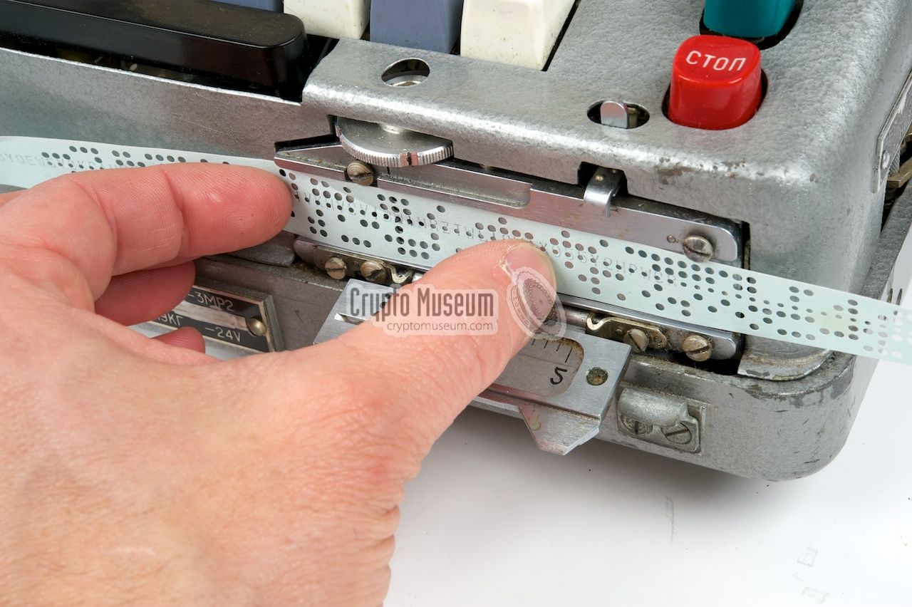 Placing a paper tape in the tape reader