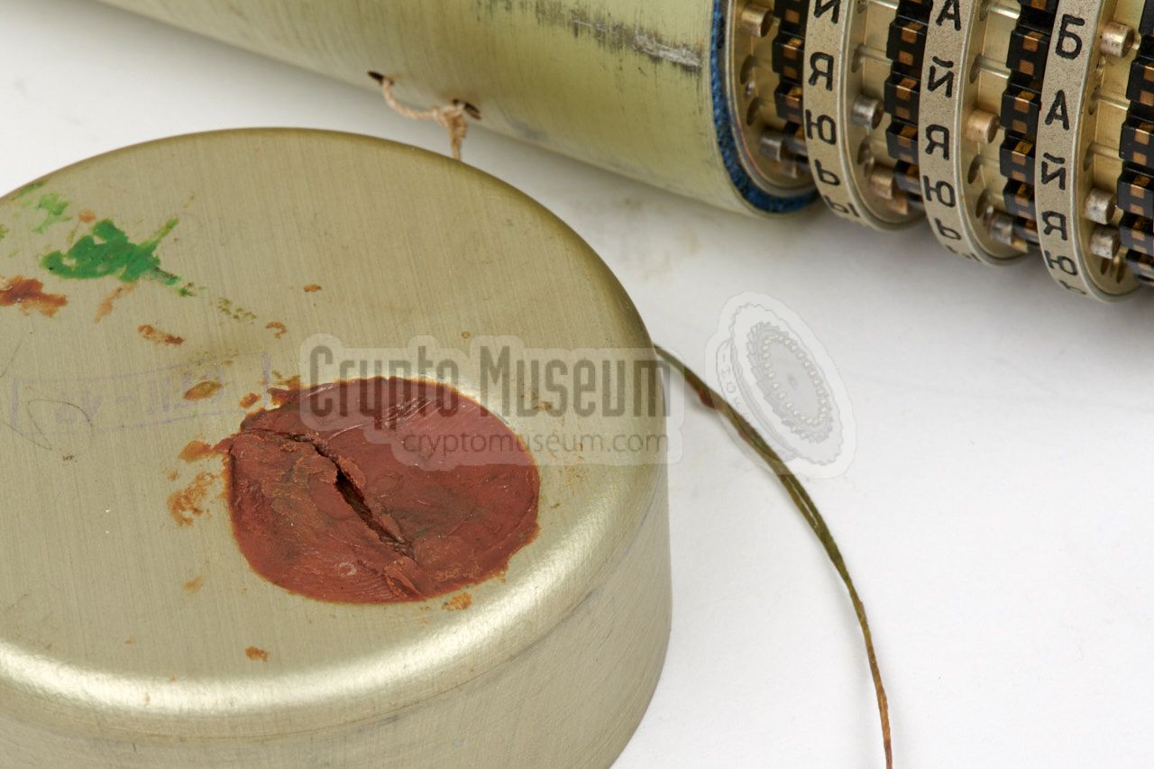 Original wax seal on the cylindrical container