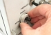 Removing the ring from the mains voltage selector