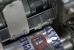 The paper in the leftmost printer has already been loaded. The paper in the rightmost printer is currently being loaded.