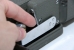 The handle fully pushed down and locked into position