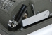 The grip in storage position. The cover of the case may now be closed.
