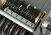 Guide arm locking bar
