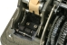 Cradle for the print head. The curved bracket is part of the F/V feature