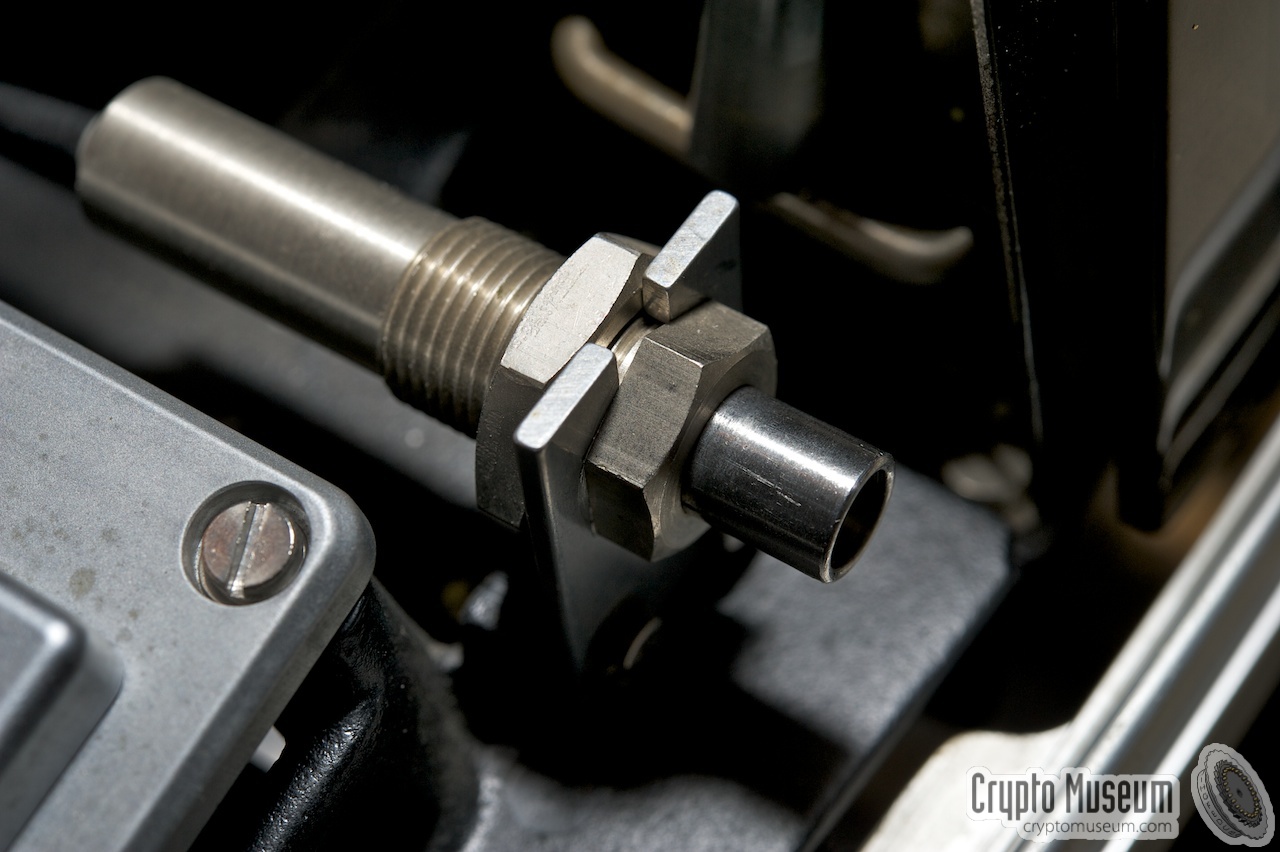 The rightmost cable-operated case lock, controlled by the primary KESO key, Shown here in closed state.