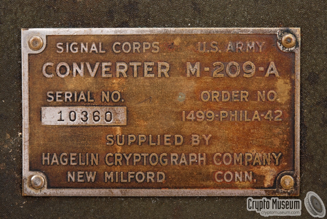 Close-up of the serial number plate of the M-209-A