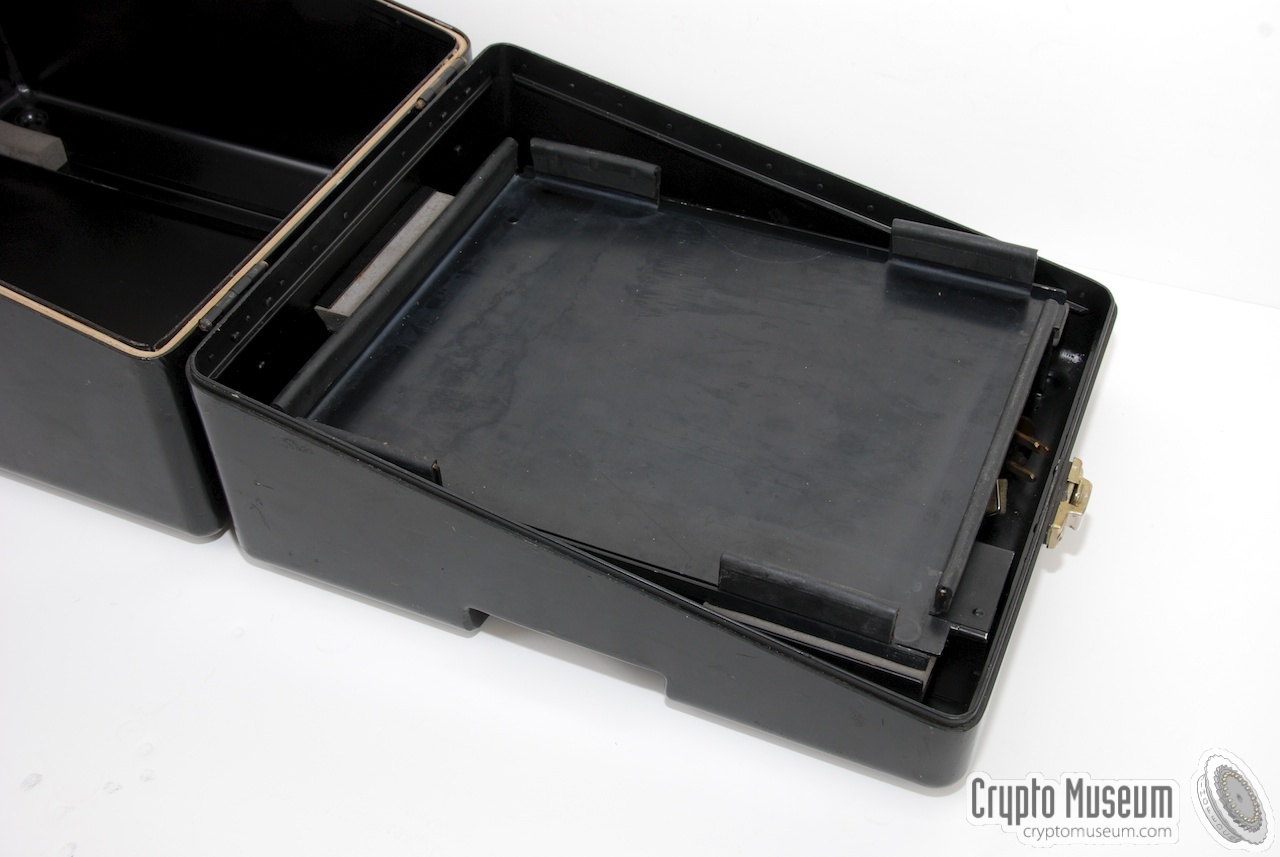 The transit case with the machine's mounting base still in it