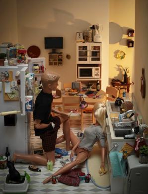 Ken and Barbie involved in compromising activity in their rather messy kitchen.