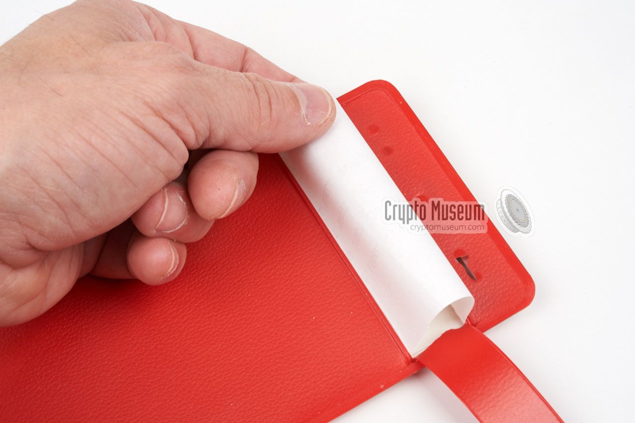 Removing an OTP sheet via the 'letter box'