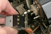 Detached connector of device behind the keyboard