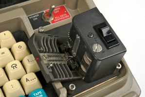 Paper tape reader with open lid