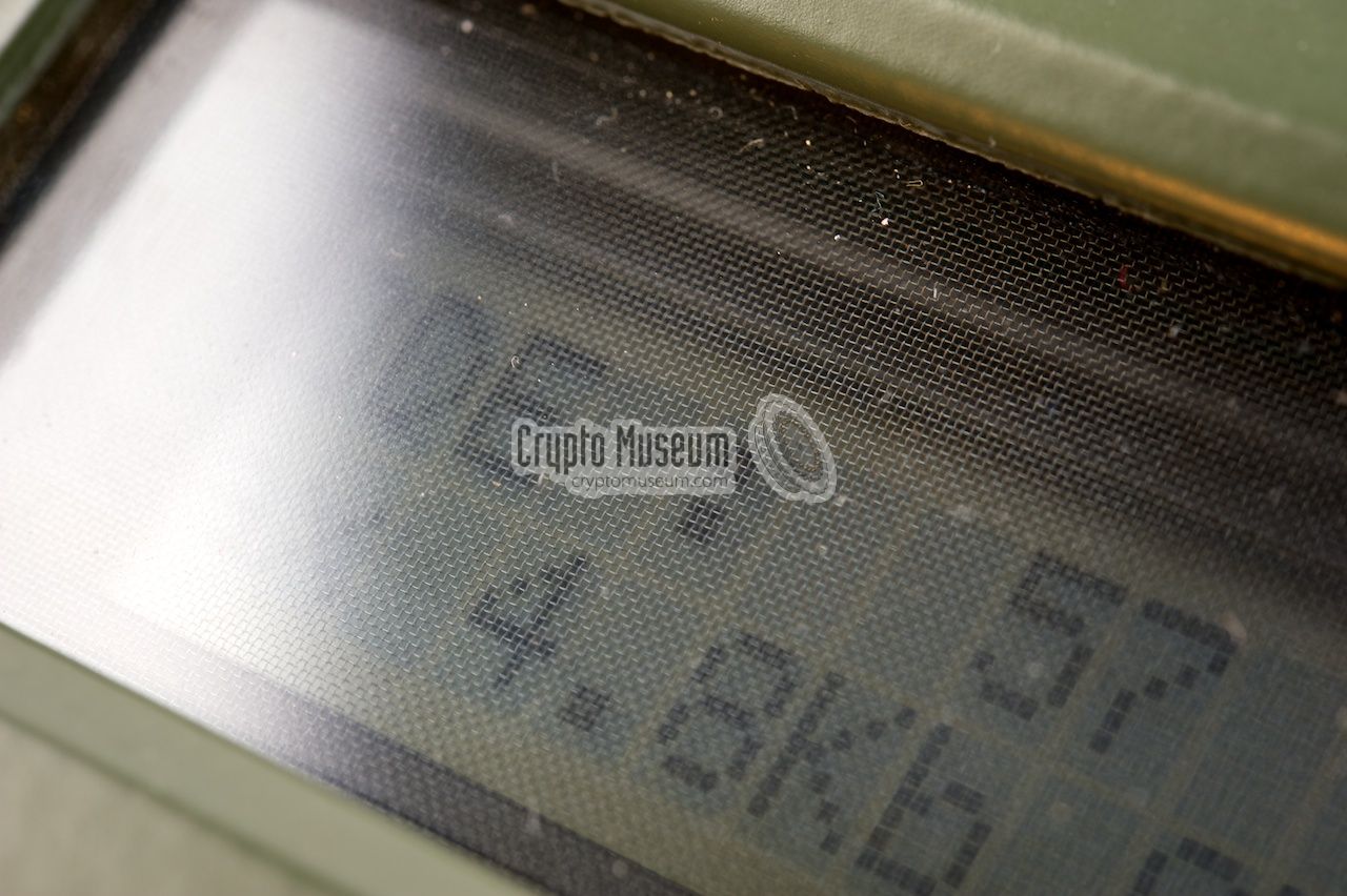 Close-up of the metal mesh grid over the display