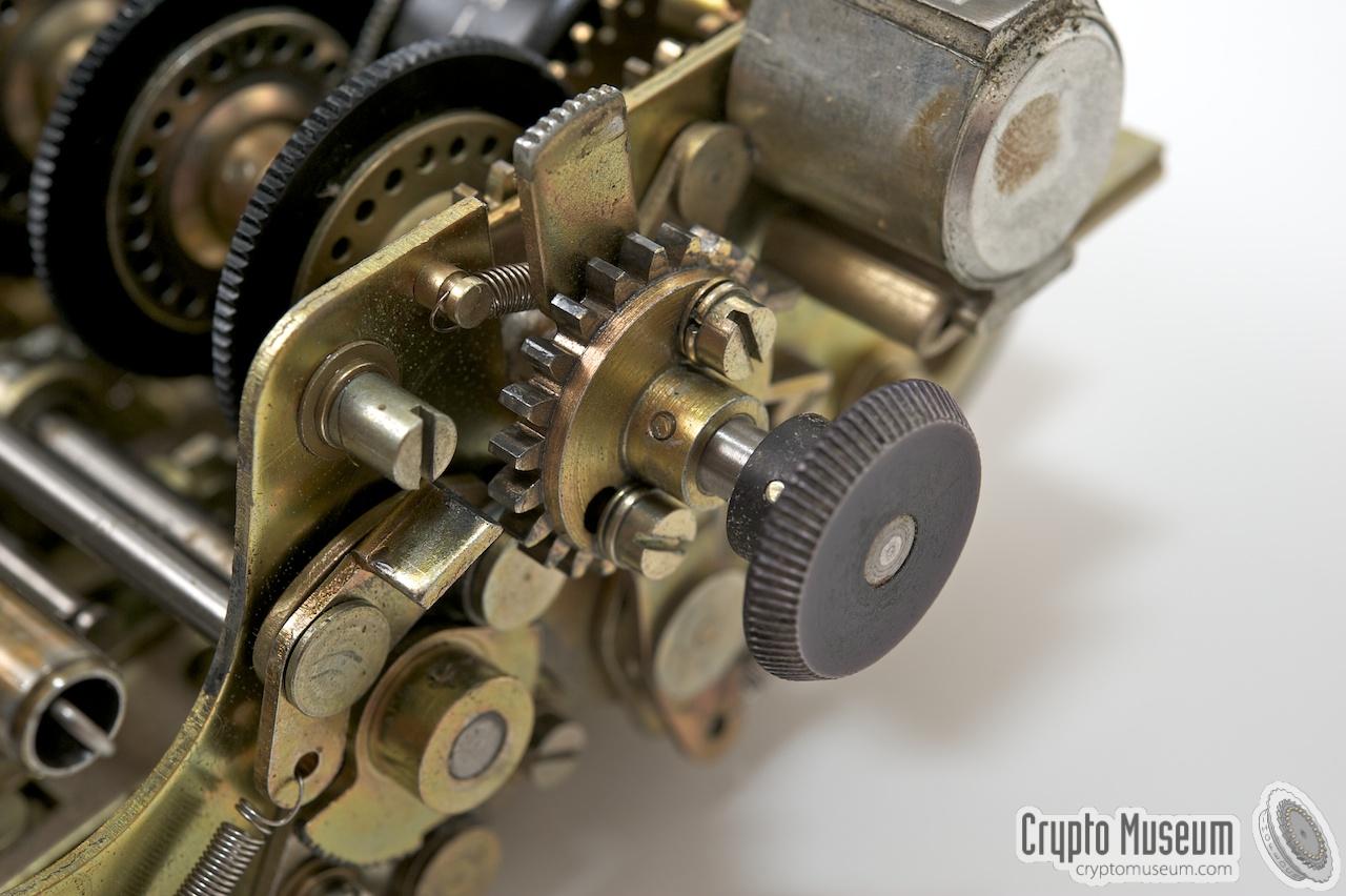 Cipher wheel axle adjustment