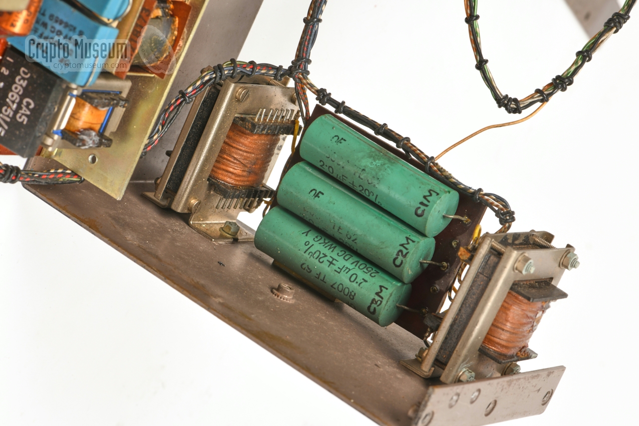 Three large capacitors at the underside of the bypass circuit