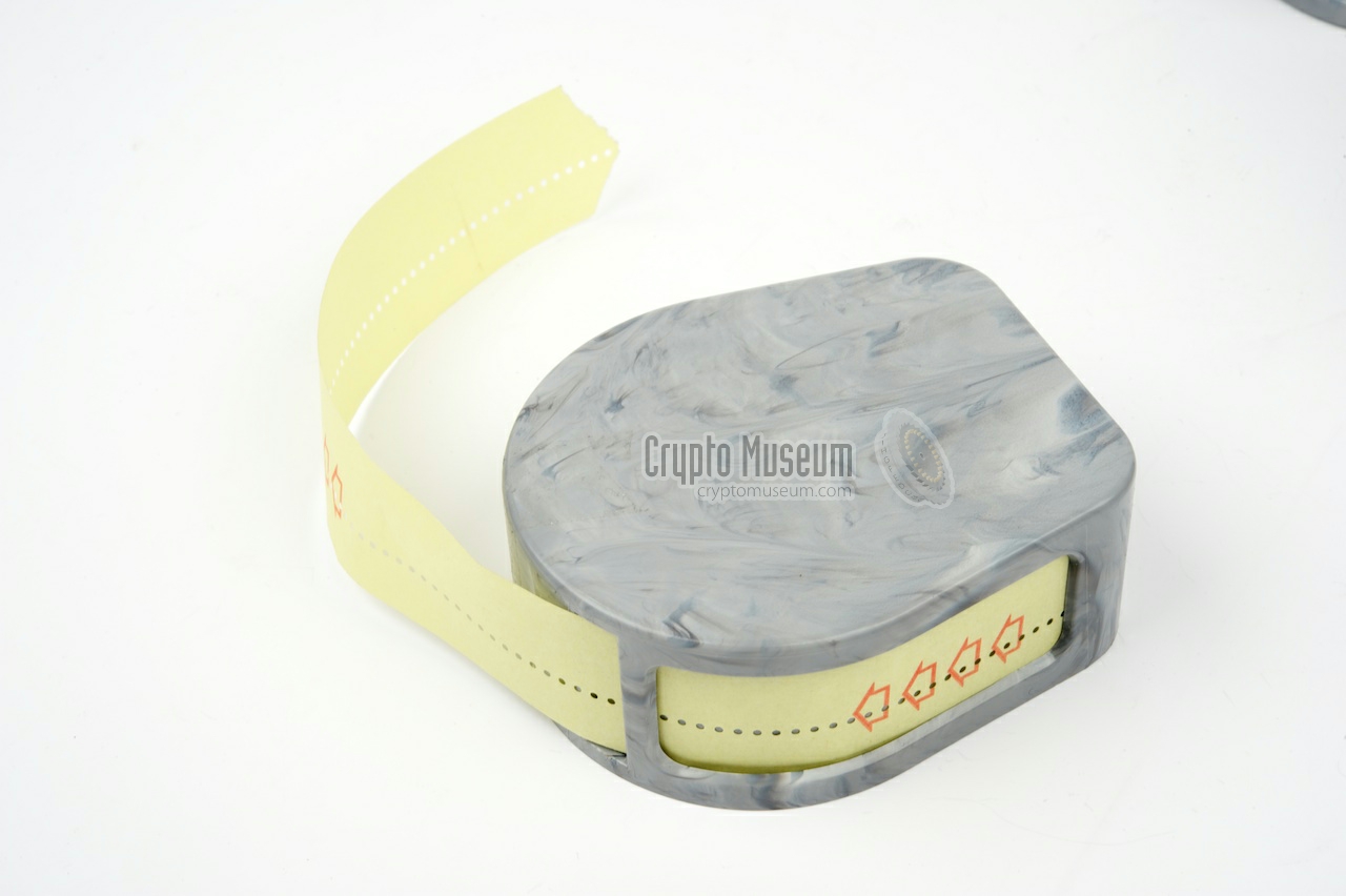 Plastic canister with key tape