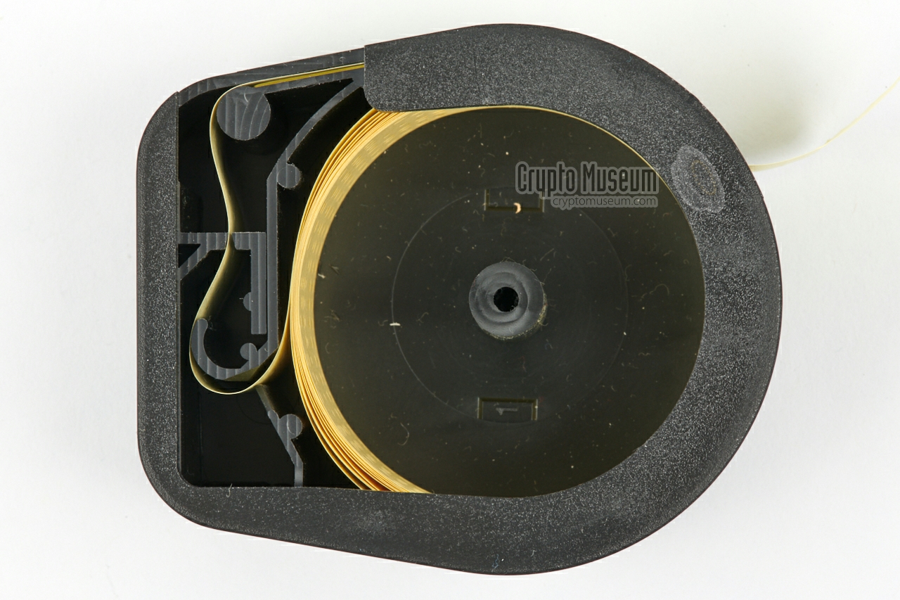 Black key tape canister (cut-away, top view)