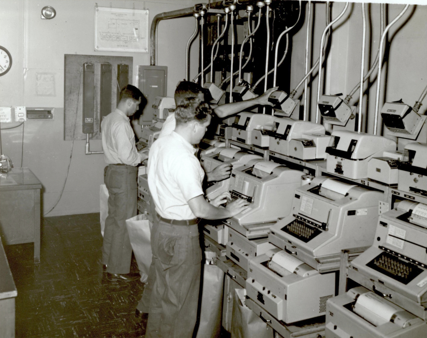 NAVCOMMSTA in Guam in 1969. The KWX-8 is operated by the man at the centre. [17]