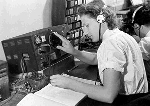 A woman of the ATS using a HRO receiver in a Y-Station [source unknown]