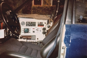 Equipment rack inside the blue Ford Granada. Note that in the door opening the original colour of the car (white) is still visible. Copyright Crypto Museum.