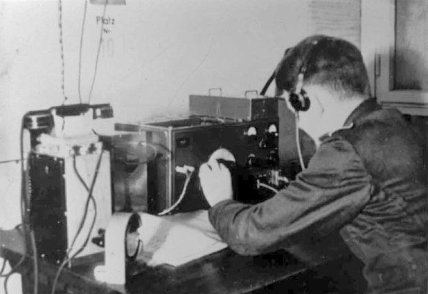 Soldier at work at desk number 10 of the Overseas Intercept at Abwehrstelle Wohldorf (near Hamburg). Copyright unknown [3].