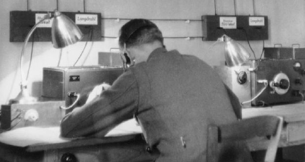 Soldier at work at the Abwehrstelle Hamburg-Wohldorf. Click to see the complete photograph. Copyright German Federal Archives (Bundesarchiv) [2].