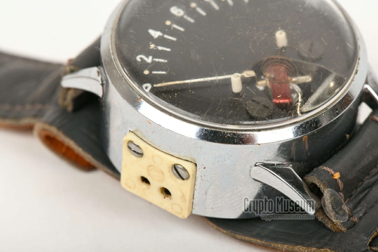 2-pin socket at the left side of the wristwatch meter