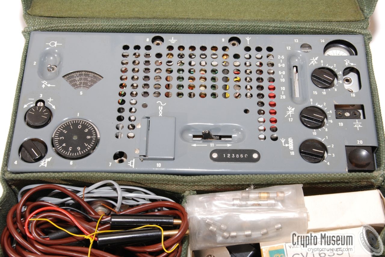 Frontal view of the transceiver. In the front some of the accessories.