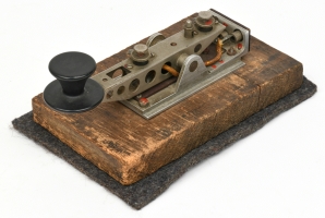 Original morse key that was used with an OD transmitter. It was originally made by NSF for use in airplanes